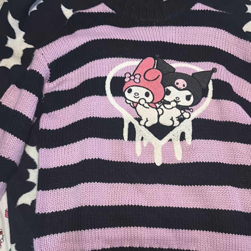 Striped Purple and Black Sweater with Character Design